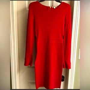 Gianni Bini red knit with bell sleeves at the wrist and side cutouts